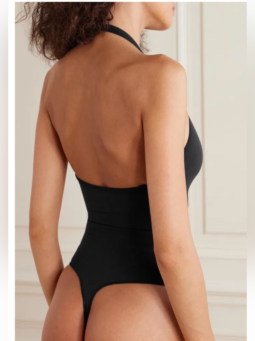 SKIMS Seamless Sculpt Deep Plunge
Thong Bodysuit - Picture 2 of 9